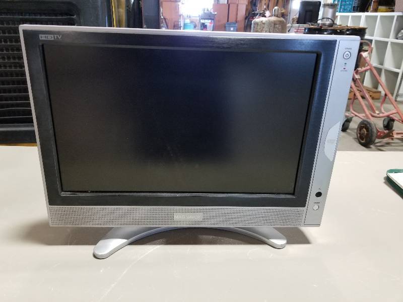 lot 28 image: 27 Inch Shart Tv, and a 17 Inch Magnovox TvDvd player