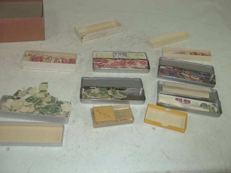 Tins with assorted Stamps