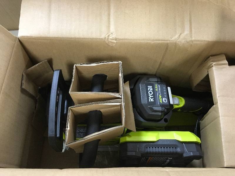 Ryobi 40 Volt Brushless Chain Saw Kit with Battery and Charger in Like New working conditions