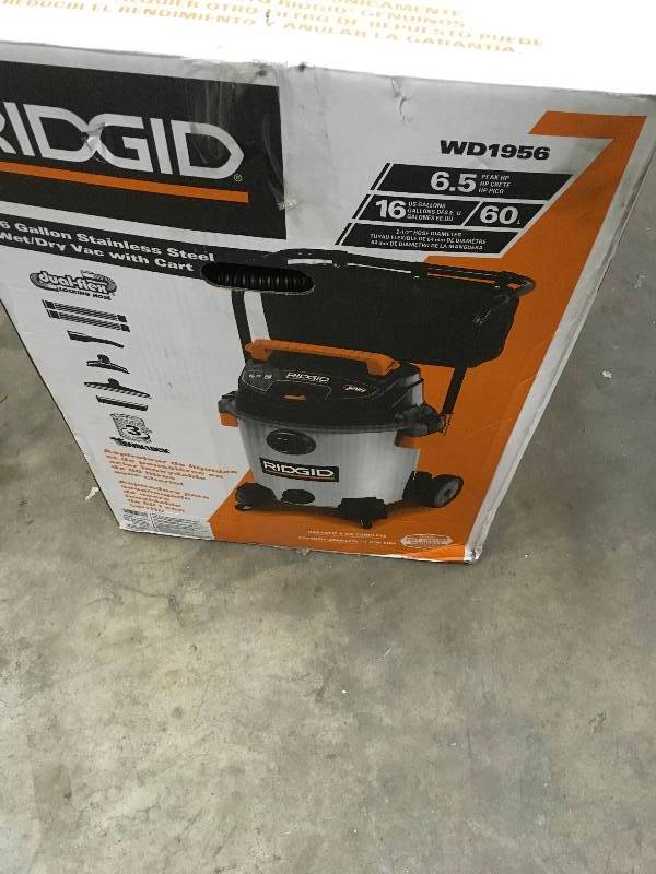 lot 37 image: Ridgid 16 Gallon Stainless Steel WetDry vac with Cart open box never used
