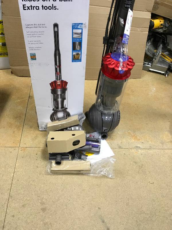 lot 1 image: Dyson V8 Ball Vacuum Strong Rides on a ball Extra Tools in like New conditions