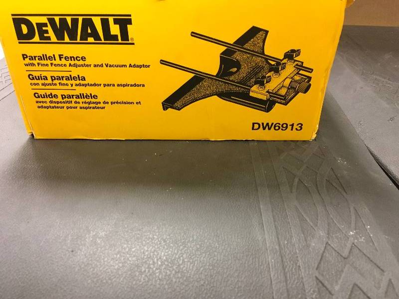 lot 22 image: DeWalt Parallel Fence with Fine Fence Adjuster and Vacuum Adaptor
