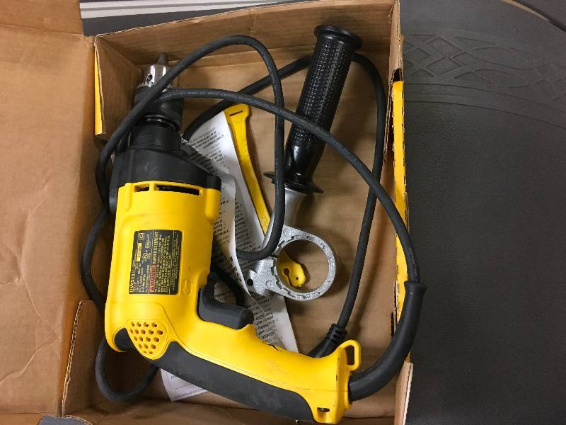 lot 31 image: DeWalt 12 in. Hammer Drill in  working conditions