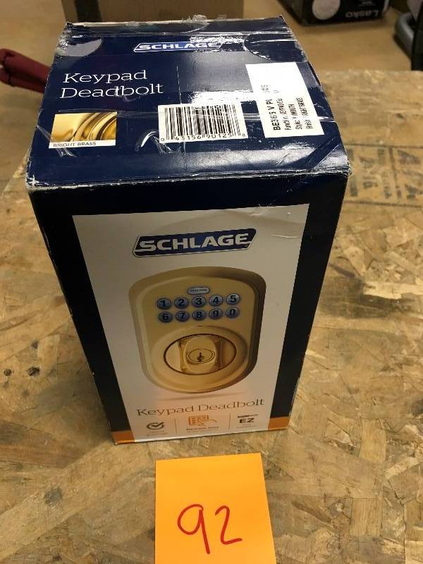 lot 92 image: Schlage Lock BE365V Ply 505 Electronic Deadbolt LT Brass Finish  Bright Brass open box never used