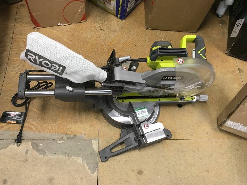 lot 115 image: Ryobi 15 Amp 12 in. Sliding Miter Saw with Laser in like New working conditions