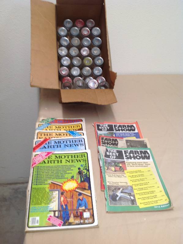 lot 56 image: Small Glass Jars and The Mother Earth News and The Farm Show Magazines.