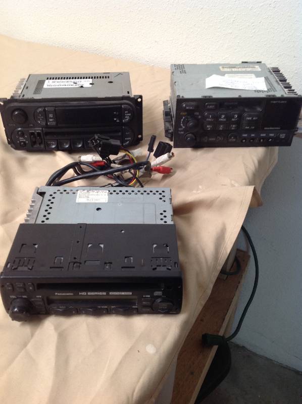 lot 75 image: Three Car Stereos - Panasonic, Chrysler and Chevy