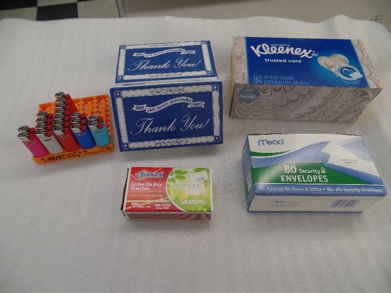 lot 29 image: Lighters, Matches, Kleenex & Envelopes