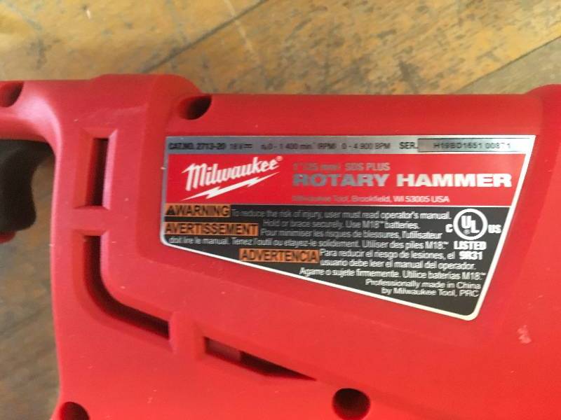 lot 20 image: Milwaukee M18 18 Volt Cordless Lithium-Ion 1 in. SDS Plus D-Handle Rotary Hammer in working conditions