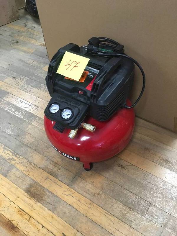 lot 47 image: Porter Cable 6 Gallon Oil Less Pancake Air Compressor in working conditions