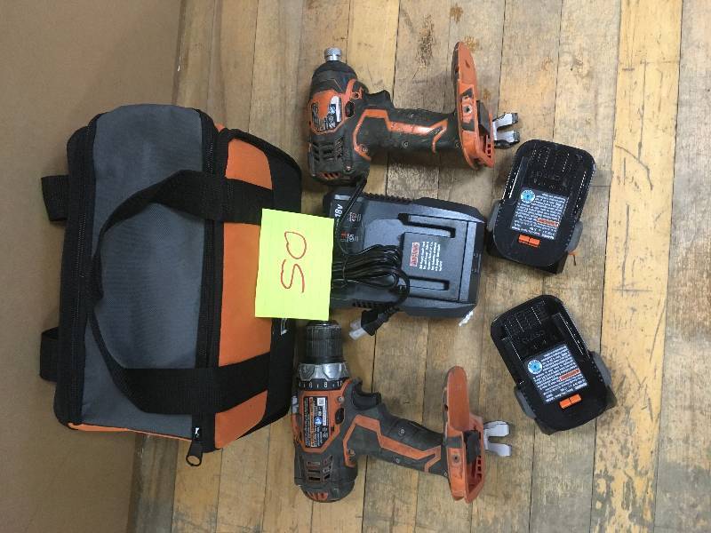 lot 50 image: Ridgid 18-Volt Drill and Impact Driver Kit in working conditions