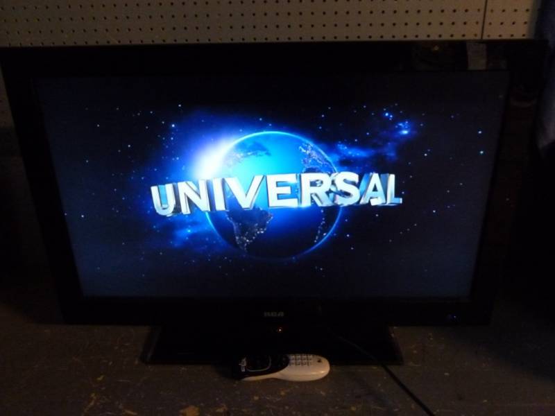 lot 1 image: Flat Screen T.V  With DVD