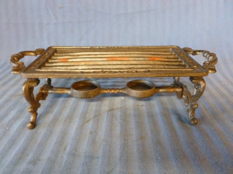 lot 131 image: Cast Iron Candle Warmer