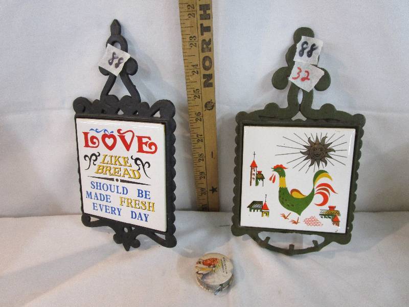 lot 32 image: 2 Cast Iron Trivets