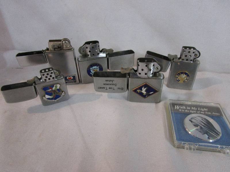 lot 35 image: Various Military Lighters