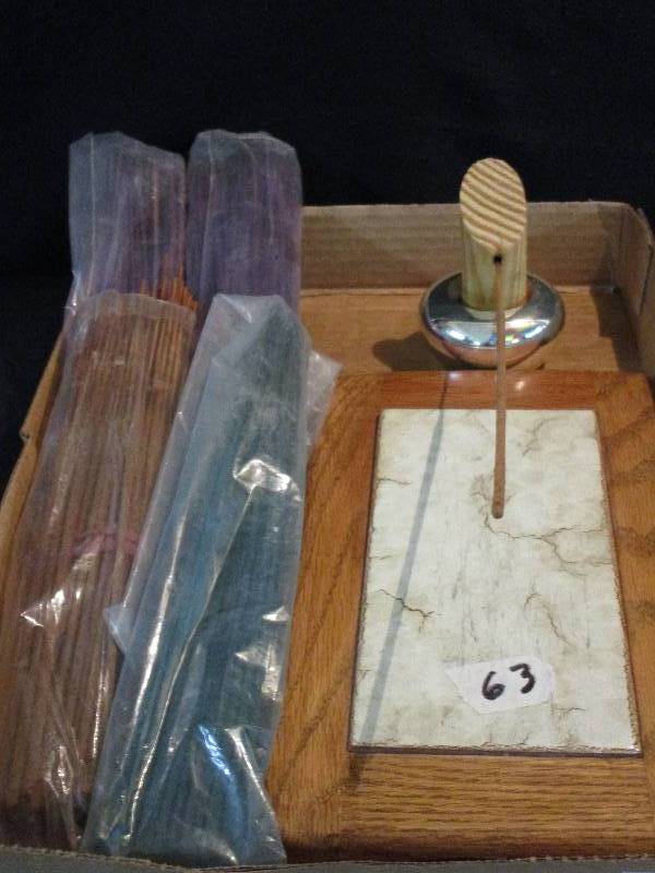 lot 56 image: Incense holder and 4 packs of Incense