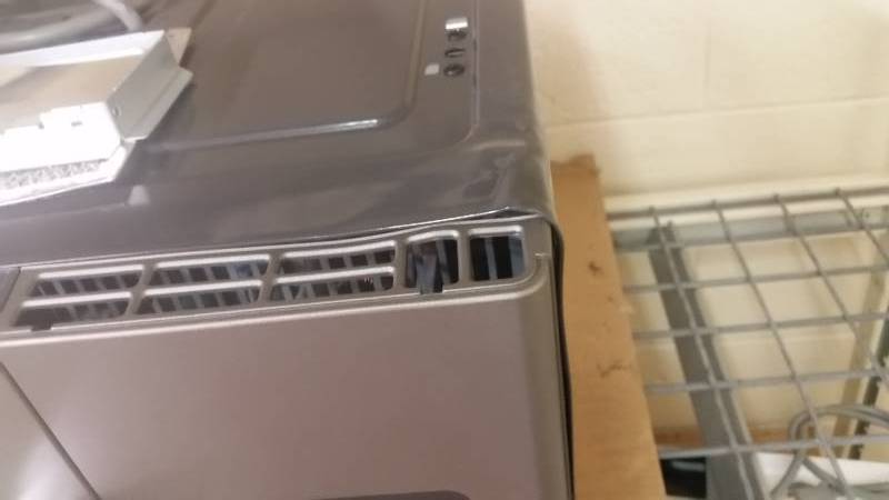 lot 15 image: GE Over The Range Microwave