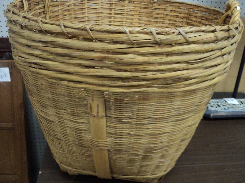 lot 9 image: large basket, 20in tall, 22in wide...
