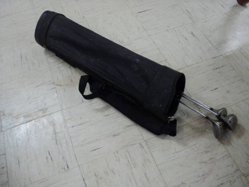 lot 34 image: golf bag and 3 clubs...