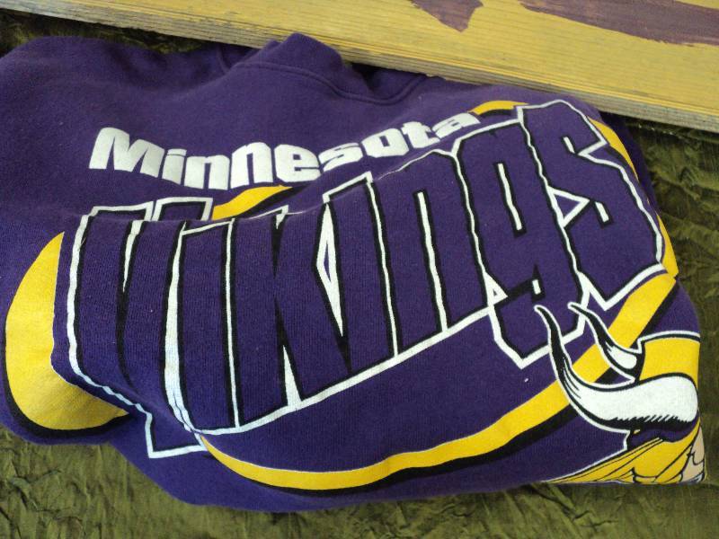 lot 76 image: vikings sweatshirt L, kids M, sign ...