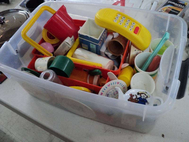 lot 116 image: tub of play dishes...