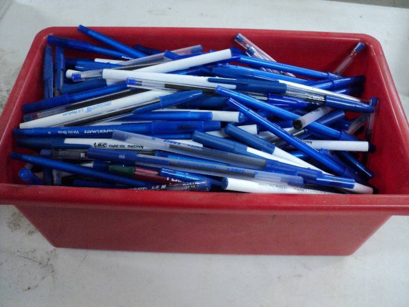 lot 126 image: 4 x 12 container full of new pens...