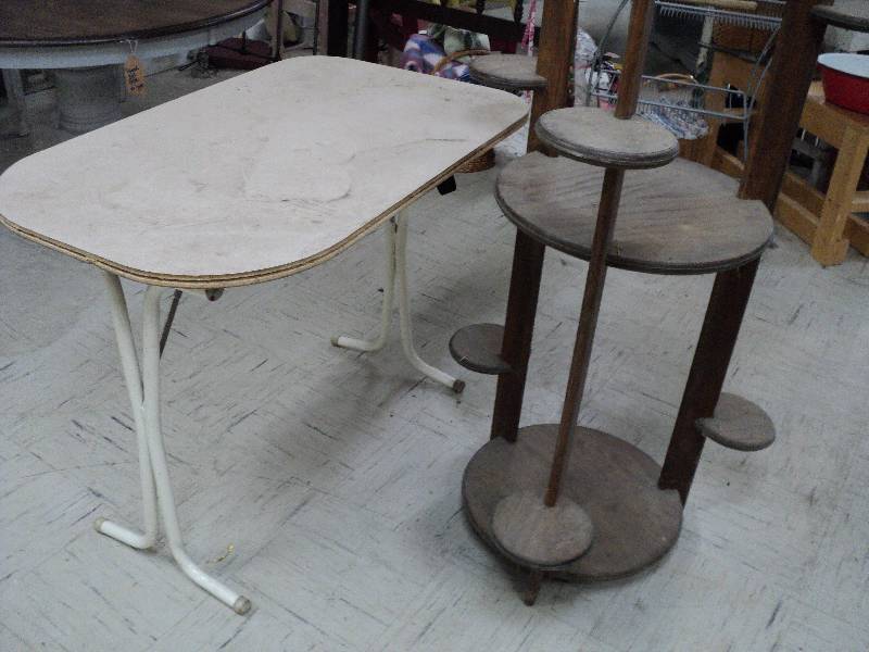 lot 208 image: table and wood plant stand...