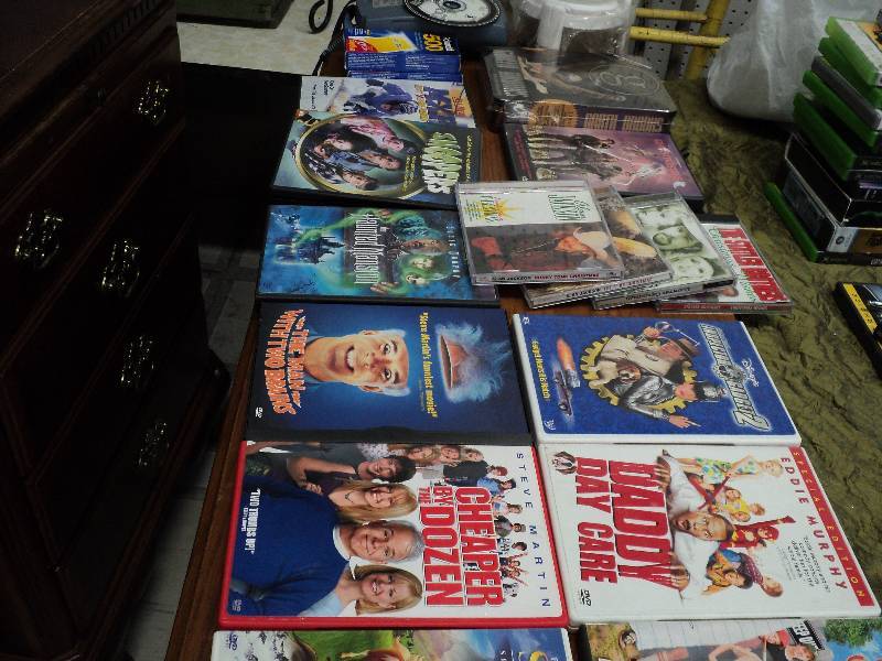 lot 214 image: CDs, camera, DVDs - everything pic...