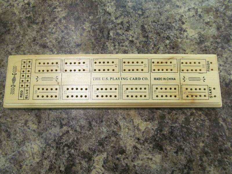 U .S Playing Card co. cribbage board