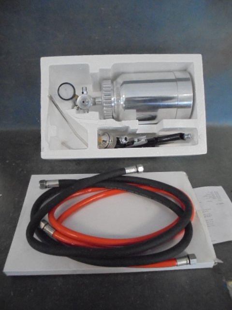 lot 43 image: Spray Canister and Remote Gun