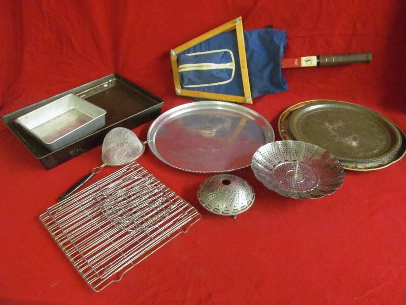 lot 14 image: vintage tennis racket, bake pans