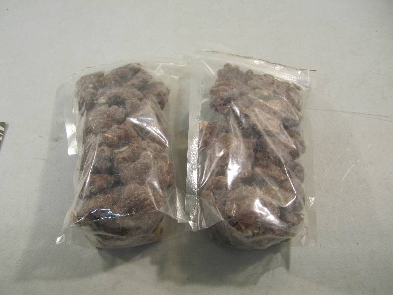 lot 124 image: 2 Bags of Chocolate Covered Peanut ...