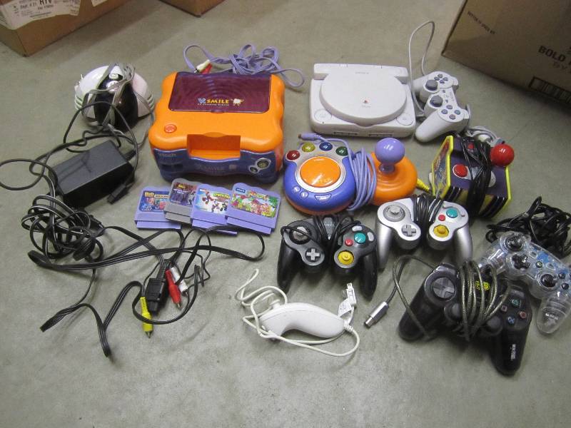 lot 200 image: Box Full of Misc Video Game Systems...