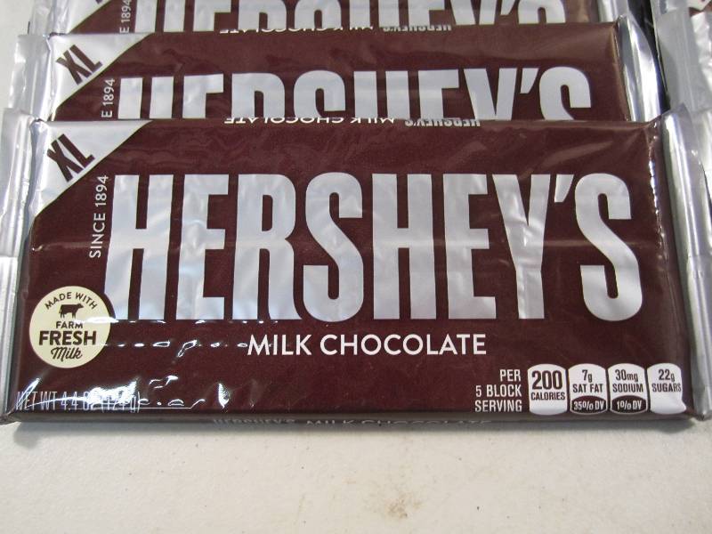 lot 295 image: Lot of 12 X-Large Hersheys Milk Cho...