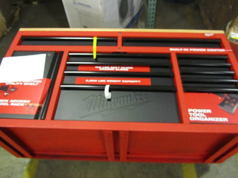 lot 1 image: Milwaukee 60.125 in. 11-Drawer and 1-Door 22 in. D Mobile Workbench , Red and Black