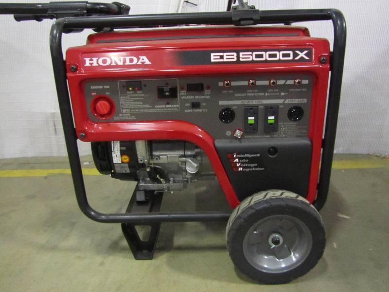 lot 29 image: Honda 5,000-Watt Gasoline Portable Generator with GFCI Outlet Protection and iGX OHV Commercial Engine