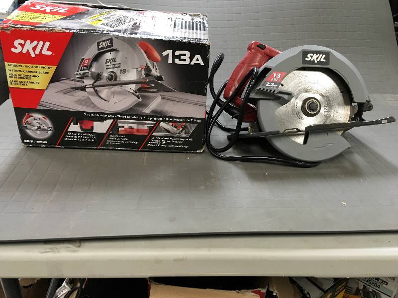 lot 11 image: Skil 13 Amp 2.3 HP, 7-14 in. Circular Saw  in like new conditions