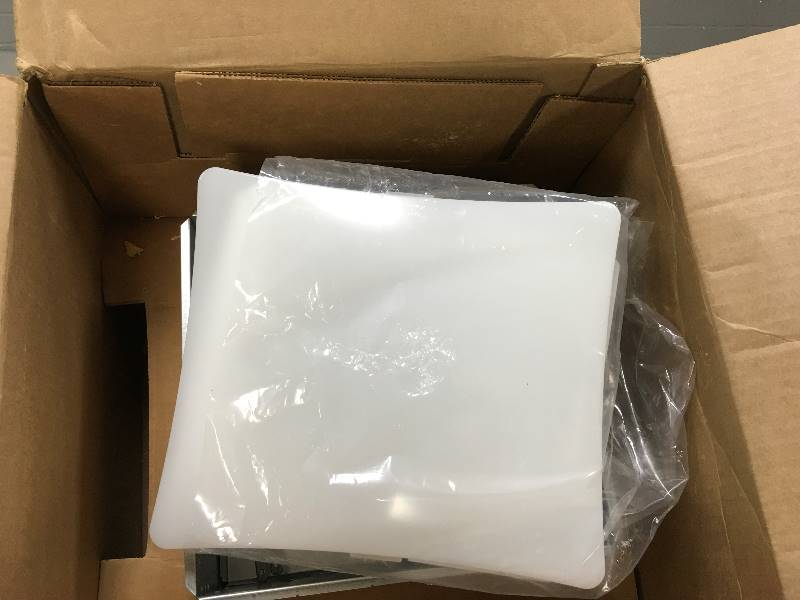 lot 21 image: NuTone 50 CFM Ceiling Exhaust Bath Fan with Light not used