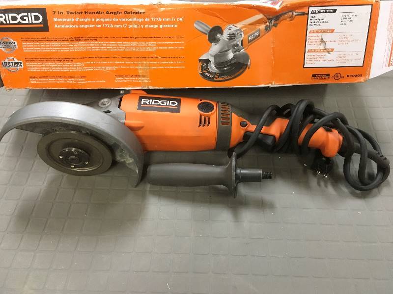 lot 56 image: Ridgid 7 in. Twist Handle Angle Grinder in working conditions