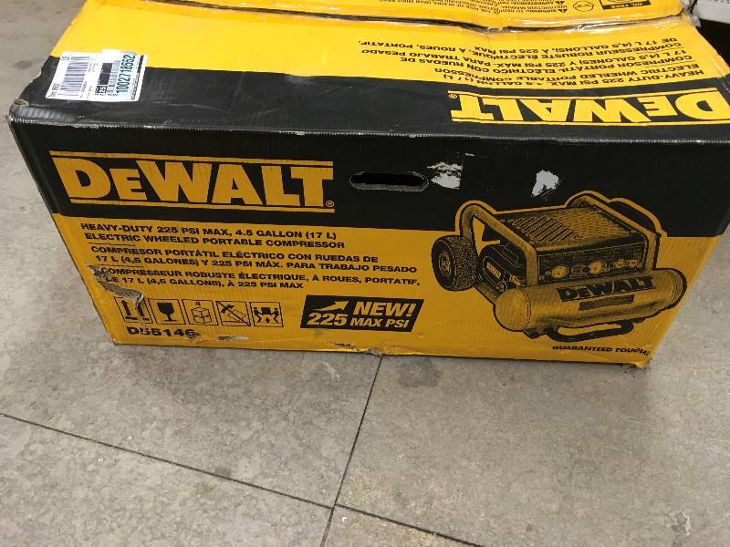 lot 77 image: DEWALT  4.5 Gal. Portable Electric Air Compressor in like New working conditions Model # D55146