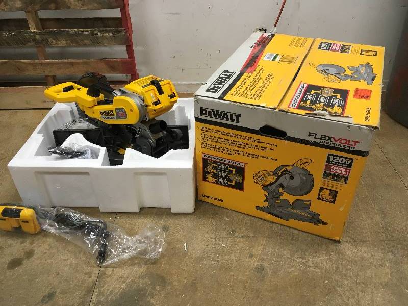 lot 78 image: DEWALT  FLEXVOLT 120-Volt MAX Lithium-Ion Cordless Brushless 12 in. Compound Miter Saw with AC Adapter (Tool-Only) Model # DHS716AB open box never used