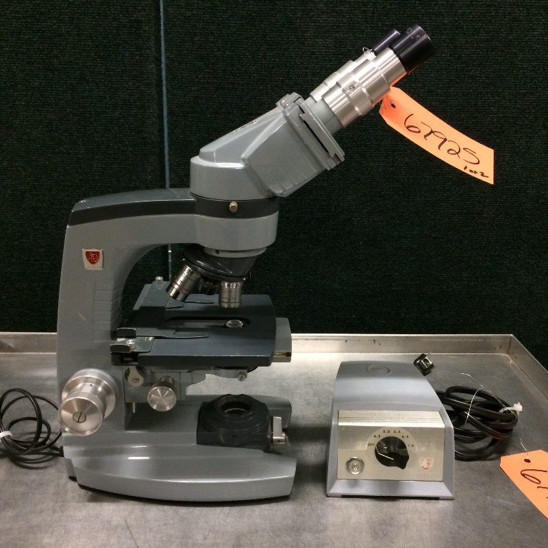 lot 20 image: American Optical Spencer Binocular Microscope Includes 3 Objectives With AO 1051 Transformer Power Supply - Excellent Working Condition