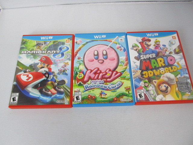 lot 123 image: 3 Nintendo Wii U Games - Mario Kart 8, Kirby etc