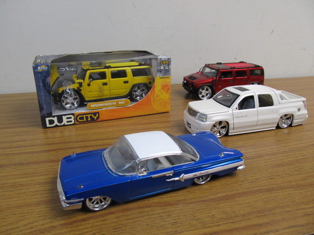 lot 188 image: Set of 4 DUB CITY 122 Diecast Vehicles