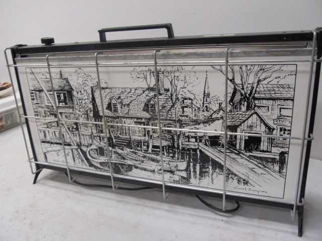 lot 15 image: Vintage Brown & Bigelow Porcelain Heater 