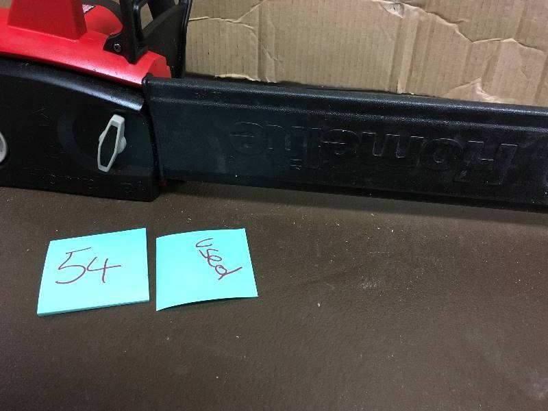 Homelite 16 in. 12 Amp. Electric Chainsaw used in working condition