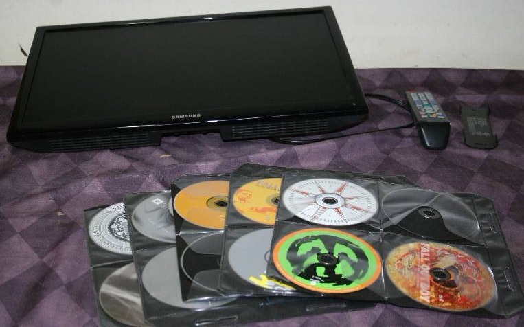 Wall Mount TV and CDs