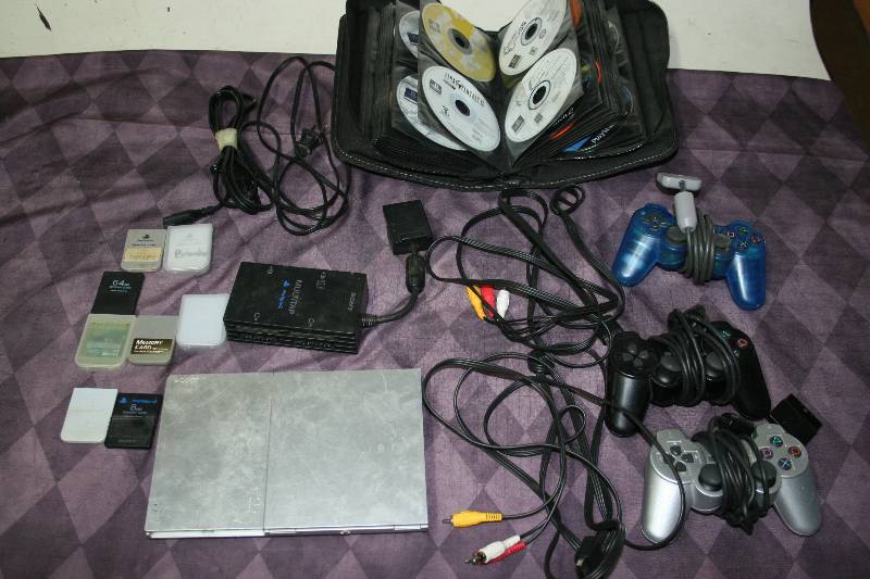PlayStation 2 with Games and Accessories