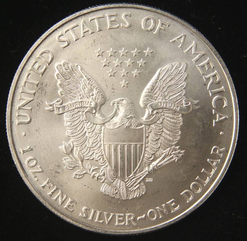 lot 63 image: 1997 AMERICAN SILVER EAGLE 1 TROY OZ. .999 FINE SILVER