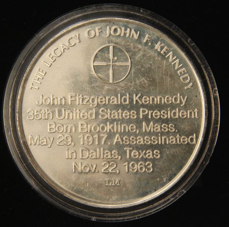 lot 70 image: 1 TROY OZ. .999 FINE SILVER VINTAGE JFK ASSASSINATION IN AIRTITE